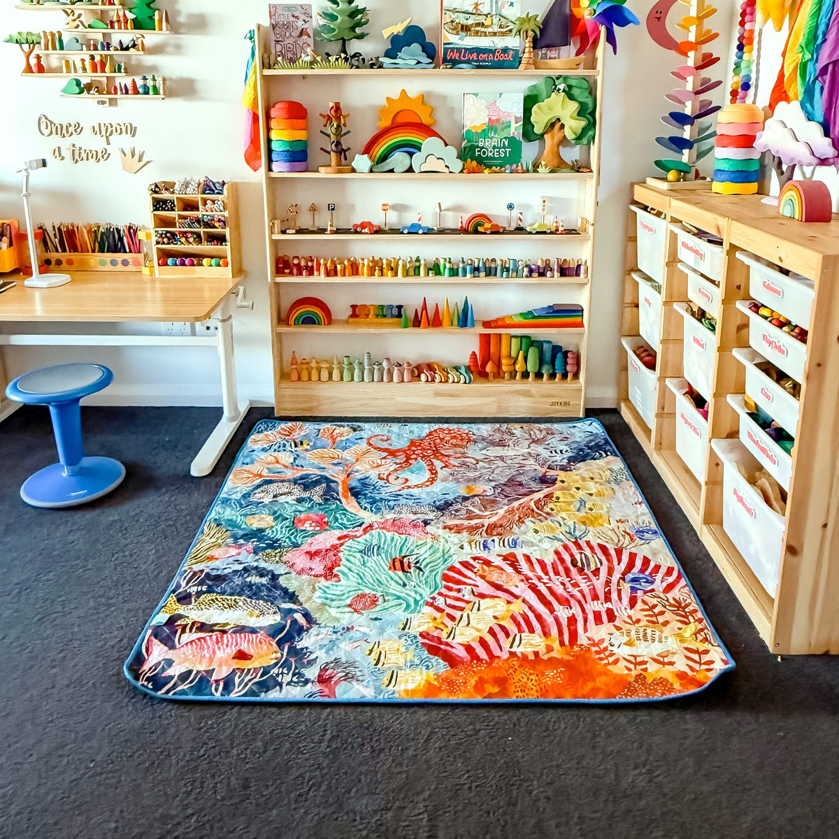 octopus's garden large waterproof playmat laid out in a bright playroom